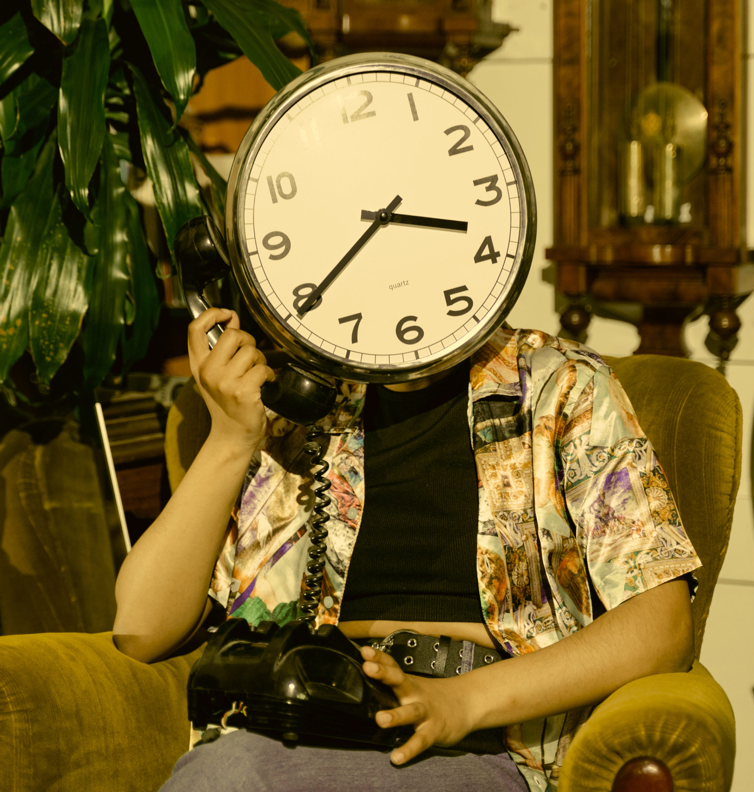 person with a clock as a face making a phone call